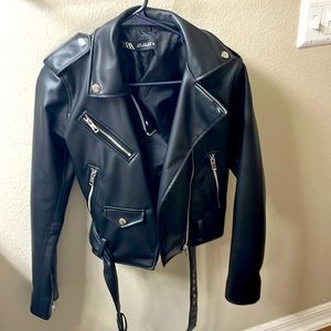 A new leather jacket size S have never been used!